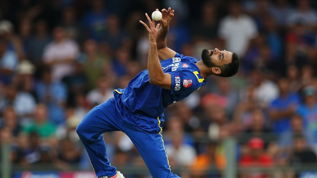 Tight sideline frame of a bowler in his release stride, the front arm braced and the ball just leaving the hand during a Hampshire List A fixture